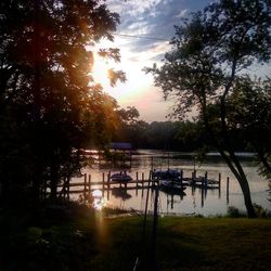 Scenic view of lake at sunset