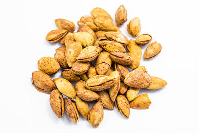 High angle view of roasted coffee against white background