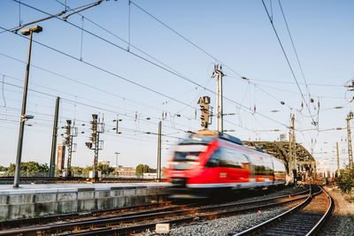 Train on railroad tracks against sky