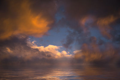 Scenic view of sea against dramatic sky