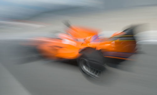 Blurred motion of car on road