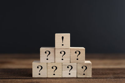 Close-up of toy on table against black background