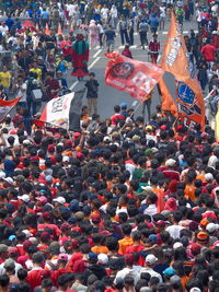 High angle view of people on street in city