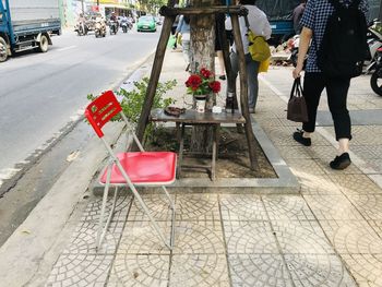 Low section of people walking on footpath