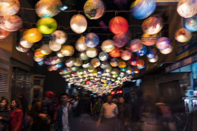 Group of people in market at night