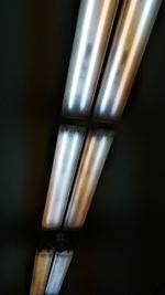 Low angle view of illuminated electric lamp