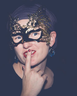 Young woman wearing sunglasses mask