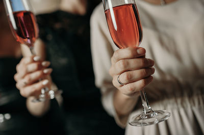 Close-up of woman holding drink