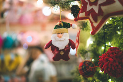 Close-up of christmas decoration hanging on tree