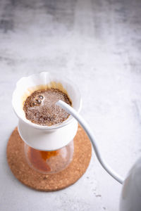 Close-up of coffee cup on table