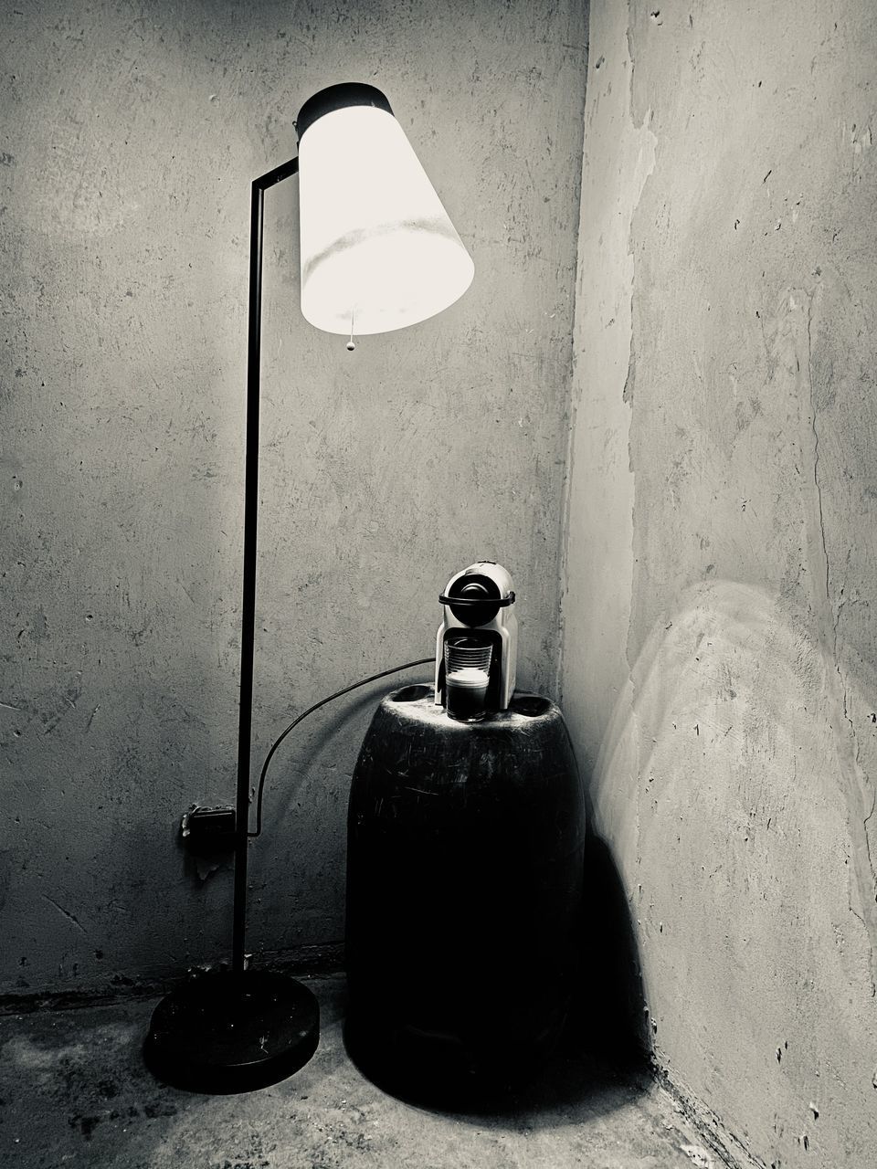 CLOSE-UP OF LAMP AGAINST WALL