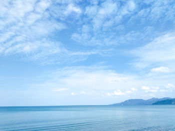 Scenic view of sea against blue sky