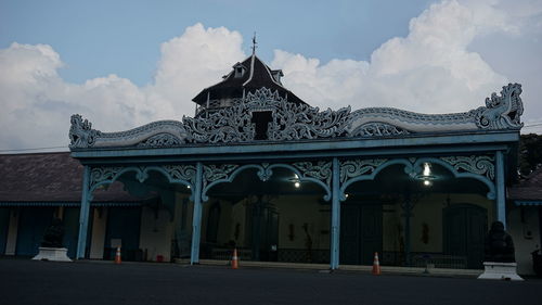 Exterior of temple against sky in city