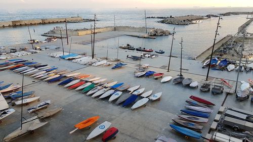 High angle view of boats moored at harbor