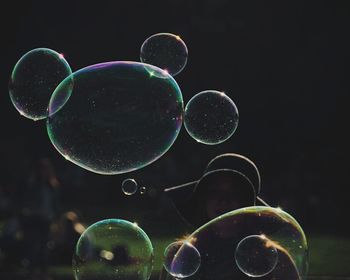 Close-up of balloons against blue background