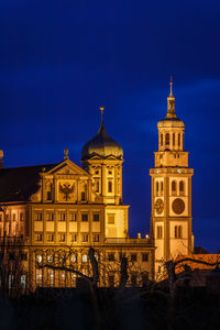 Low angle view of illuminated building at night