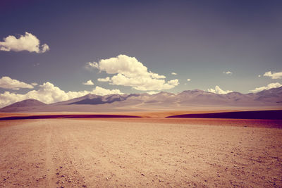 Scenic view of desert against sky