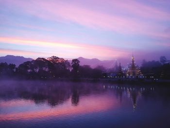 Scenic view of lake at sunset