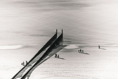 High angle view of groyne at beach