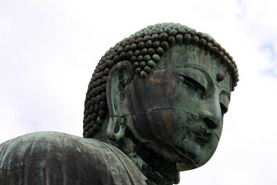 Close-up of statue against sky