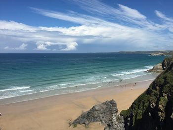 Scenic view of sea against cloudy sky