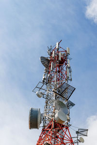 Telecomunication tower with dish and mobile antenas