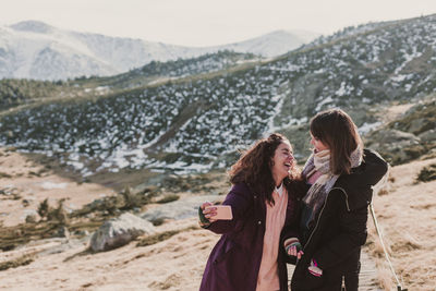 Woman standing on mountain