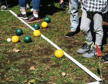 Low section of people playing football