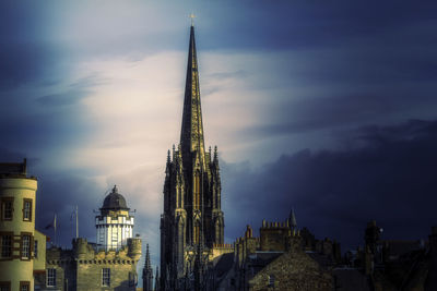 Panoramic view of buildings in city against sky