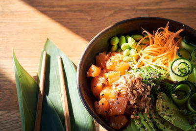 High angle view of chopped vegetables in bowl on table