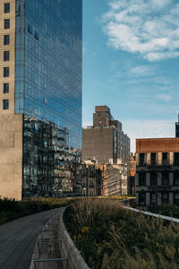 Buildings in city against sky