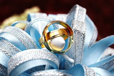 Close-up of wedding rings on metal