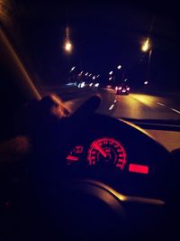 Car moving on road at night