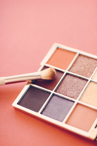 Close-up of make-up brush on table