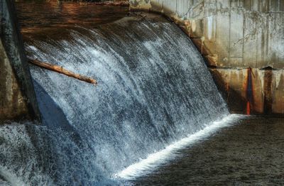 Water flowing in container