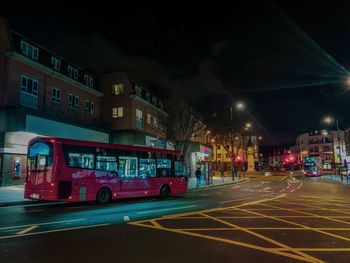 Traffic on road in city at night