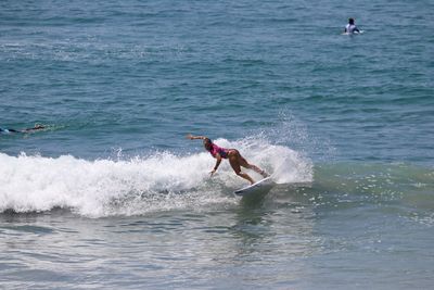 Man surfing in sea