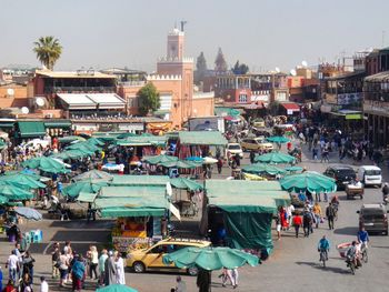 High angle view of people at market in city