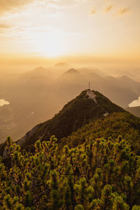 Scenic view of mountains against sky during sunset