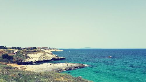 Scenic view of sea against clear sky