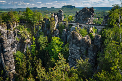 Bridge named bastei in saxon switzerland, at sunrise and the mist over the river elbe, national park 