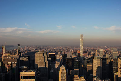 Modern buildings in city against sky