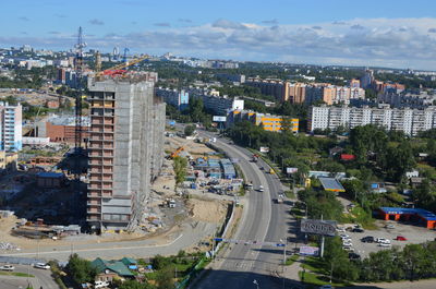 High angle view of street amidst buildings in city