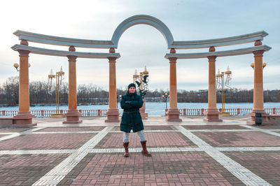 Full length of man photographing