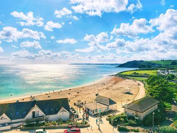 High angle view of swimming pool by sea against sky