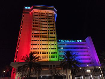 Low angle view of illuminated building at night