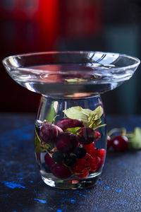 Close-up of fruits in glass on table