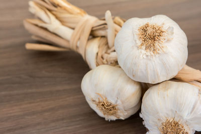 Close-up of garlics on table