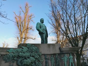 Low angle view of statue against sky