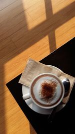 High angle view of coffee on table